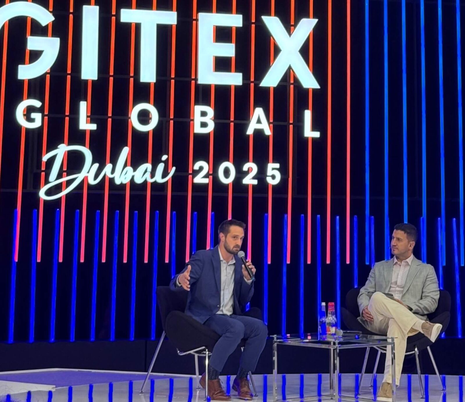 Matt Angle, CEO of Paradromics, in conversation with Massimo Marioni, Senior Editor at Fortune, during GITEX GLOBAL 2025, discussing advancements in brain-computer interfaces and AI-driven neurotechnology.